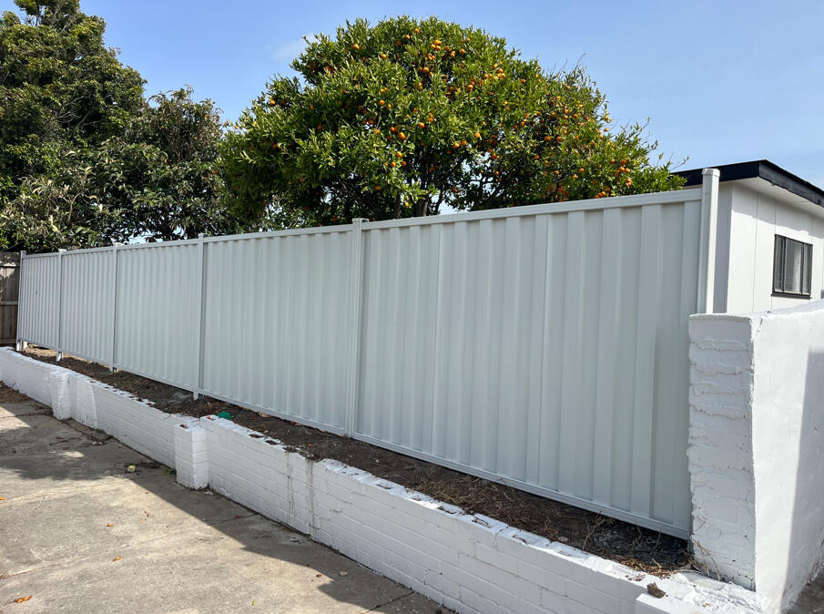 Surfmist Colorbond front garden fence installed to complement the existing home in Morwell. 1.5m high Surfmist Colorbond front garden fence completed in Morwell to complement the colour of the existing home and improve front yard presentation.