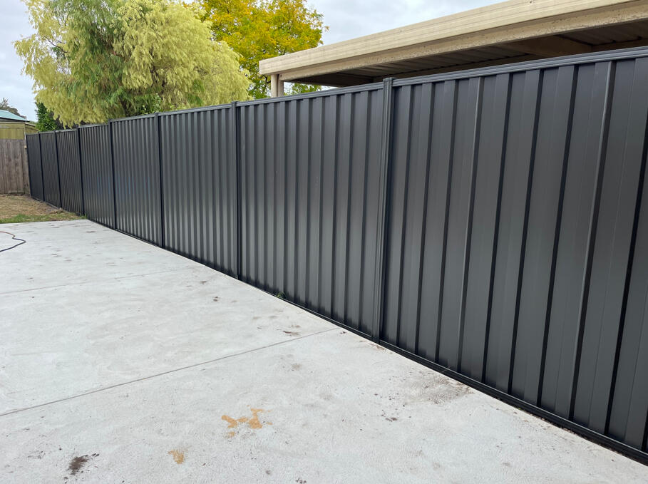 Monument Colorbond boundary fencing completed for increased backyard privacy in Cranbourne North, with the customer later requesting fencing work at two additional properties.