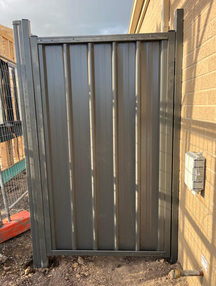 Custom Colorbond pedestrian gate completed in Clyde North for a repeat customer, designed to provide secure side property access with a matching modern finish.