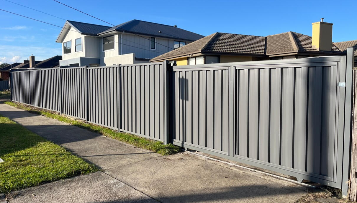 Basalt automated sliding gate with matching Colorbond fencing completed in Mulgrave. 4m automated Colorbond sliding gate and matching boundary fencing completed for a repeat customer in Mulgrave, improving property security and vehicle access.