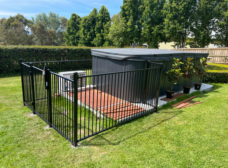 Custom pool and spa fencing completed in Drouin featuring child-safe gate hardware and secure residential pool enclosure design.